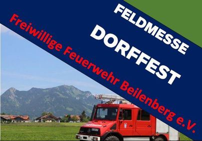 Ein Fest in der Natur mit einem roten Feuerwehrfahrzeug. Im Hintergrund sind Berge und eine ländliche Landschaft zu sehen.